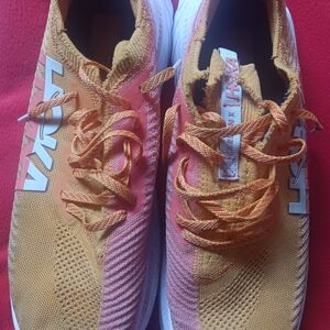 Hoka Orange and Pink Running Shoes